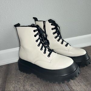 White platform combat boots.